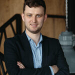 man portrait posing in a loft modern space